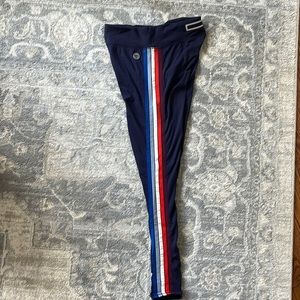 Tory Sport size small leggings with reflective side stripes